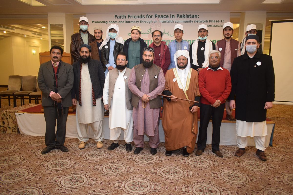 Ashar Dean with religious and community leaders at an interfaith peace event